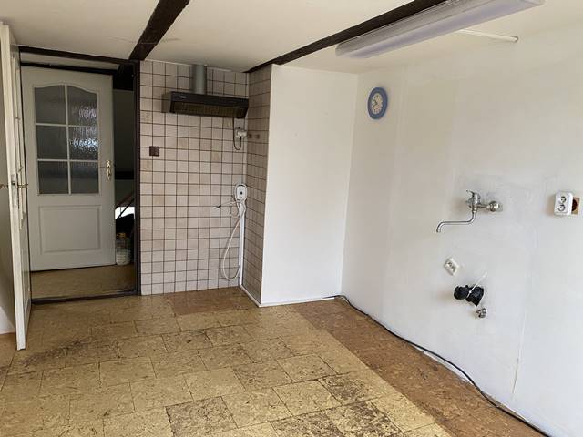 Obývací pokoj + kuchyně.