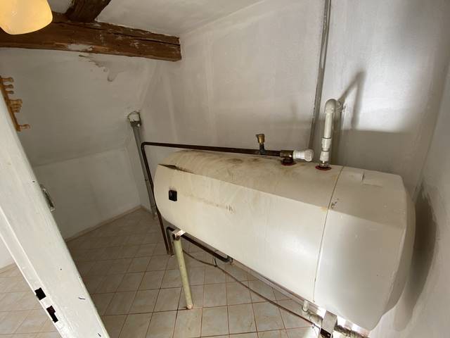 Technická místnost s bojlerem.